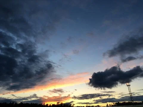 Sunset over the forest Stock Photos