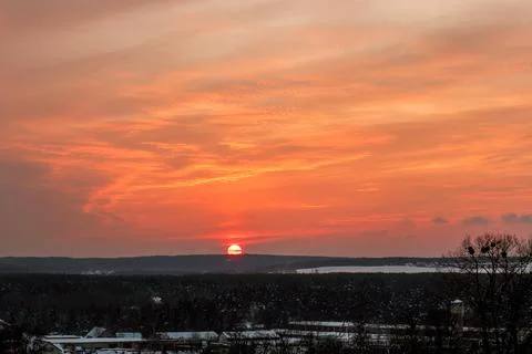 Sunset over the forest Stock Photos