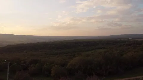 Sunset Over Forested Mountains with Trees – 4K Aerial Drone Footage Stock Footage 320198159