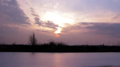 Sunset over a frozen river Stock Footage 46410908