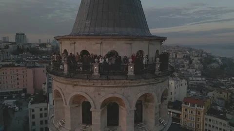 Sunset over Galata Tower in Istanbul showcasing the city skyline Stock Footage 310154770