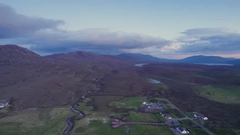Sunset over Geodha Smoo and Smoo Cave Cliffs from a drone, NC500, Scotland 스톡 동영상 198953692