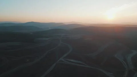 Sunset over the gold mining pit. Aerial drone view, Russia, Yakytiya Video stock 323276383