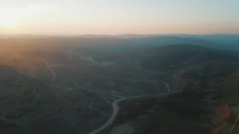 Sunset over the gold mining pit. Aerial drone view, Russia, Yakytiya 動画素材 323276615