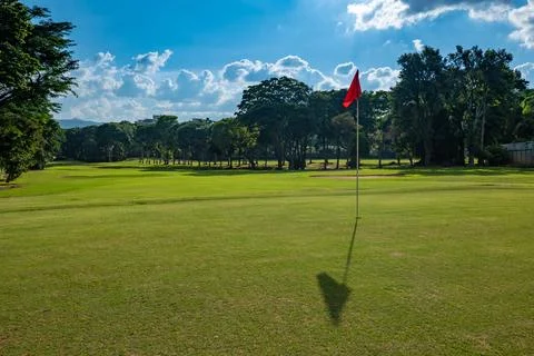 Sunset over a golf course Stock Photos