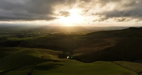Sunset over green hills Video stock 276169528