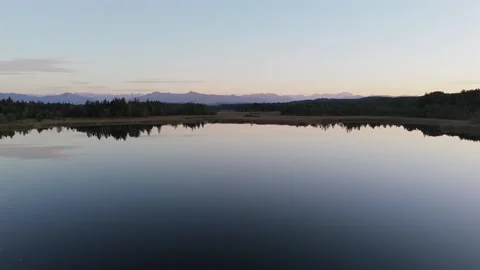 Sunset over Grosser Ostersee, Upper Bavaria, Germany. Stunning reflections Stock Footage 317760048