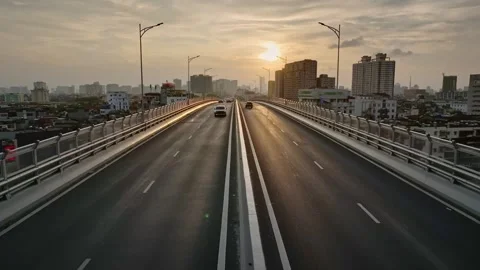 Sunset over Hanoi Elevated Ring Road 3 Crossing Giai Phong Street Stock Footage 344741992