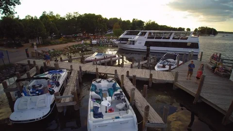 Sunset over harbor on lake Video stock 105873364