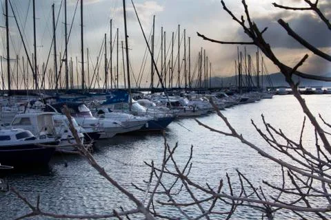 Sunset over the harbor Stock Photos