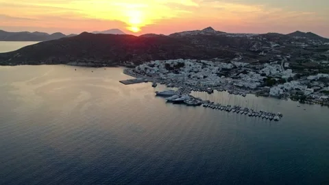 Sunset over harbor with yachts and mountains 4K Stock Footage 314753920
