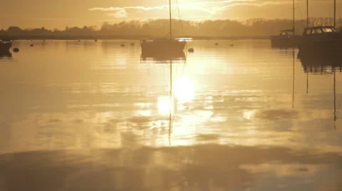 Sunset over Harbour with boats in Background 스톡 동영상 34294593