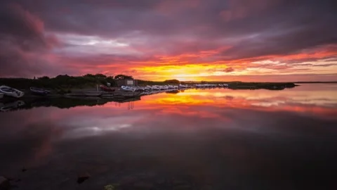 Sunset over the Harray Loch with Mirror Reflections Stock-Footage 253194343