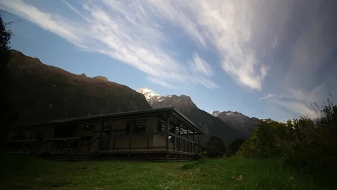 Sunset over Hidden Falls Hut, Fiordland National Park Stock Footage 78054576