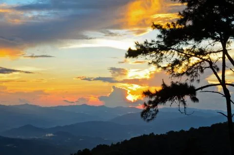 Sunset over high mountain range Stock Photos
