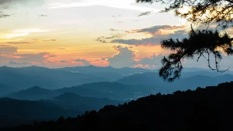 Sunset over high mountain range Stock Photos