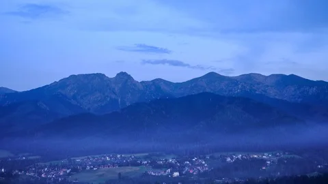 Sunset over the High Tatra Mountains in summer, Poland. Timelapse video Stock Footage 93298329