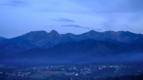 Sunset over the High Tatra Mountains in summer, Poland. Timelapse video Stock Footage 93514191