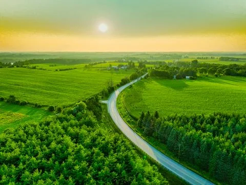 Sunset over highway and forests Foto stock