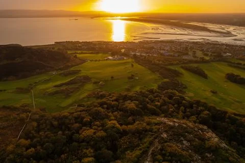 Sunset over a hill Stock Photos