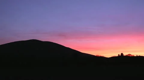 Sunset over hills Stock Footage 21895625