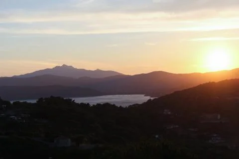Sunset over the hills Stock Photos
