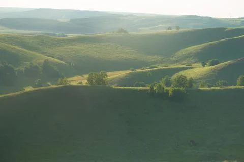 Sunset over the hills Stock Photos