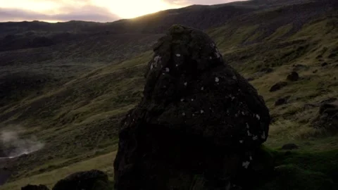 Sunset over the hilly terrain Stock Footage 130465448