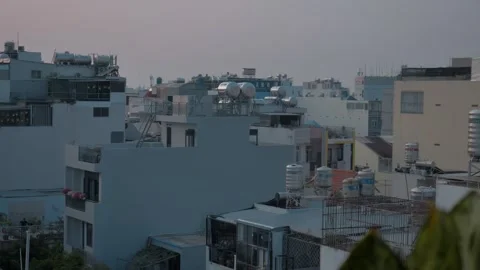 Sunset Over Ho Chi Minh City Rooftops Stock Footage 303038597