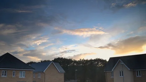 Sunset over housing TL 库存影片 129572966