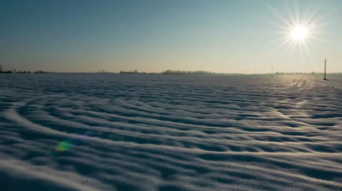 Sunset over an ice and snow covered landscape Stock-Footage 63198034