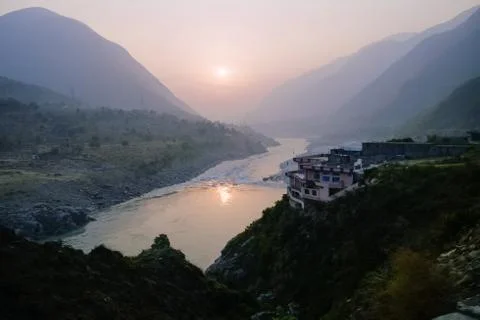 Sunset over Indus river and layers of Karakoram mountain range. Stock Photos
