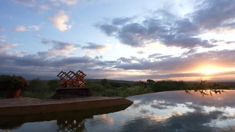 Sunset over an infinity pool Stock Footage 327785218