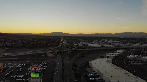 Sunset Over the Interstate Las Vegas &amp; Mountains Background Aerial View Stock-Footage 98144456