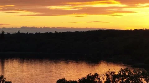 Sunset over irish lake Video stock 199446527