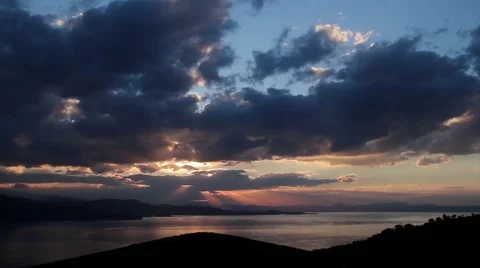 Sunset over an island after a storm Stock Footage 40353114