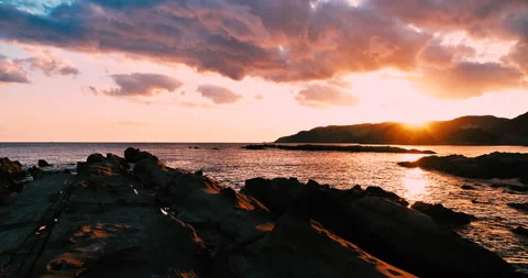 Sunset over the island Vídeos de archivo 262445696