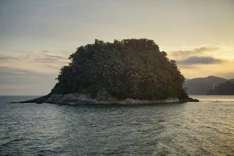 Sunset over the island Stock Photos