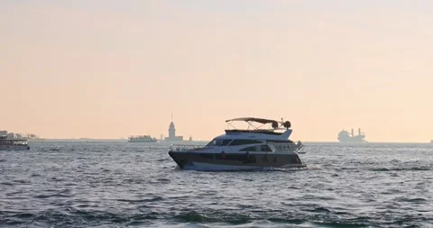 Sunset over Istanbul Bosphorus with Passing Ships in 4K Stock Footage 296285613