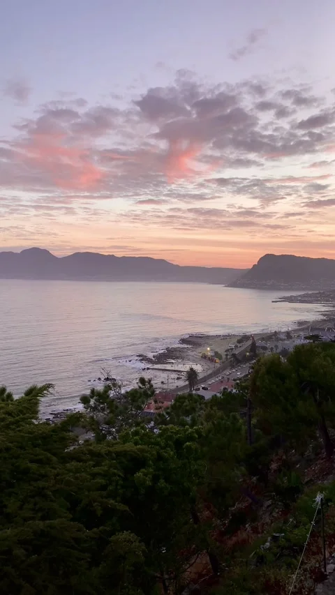 Sunset over kalk bay in the false bay cape town south africa vertical video 4K Stock Footage 318531019