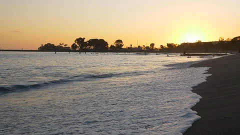 Sunset Over L.A. Beach with Surfers Video stock 116686682