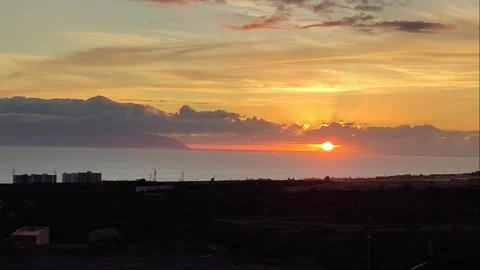 Sunset over La Gomera and Playa Paraiso Coastline - Tenerife 4K Video stock 334786274