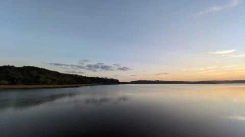 Sunset over lagoon with gorgeous reflexes and colors Stock Footage 288127797