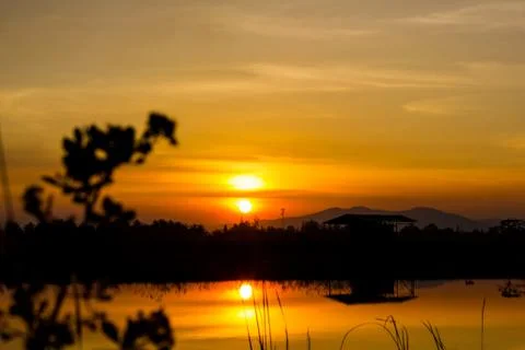 Sunset over lagoon Stock Photos