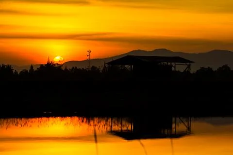 Sunset over lagoon Stock Photos