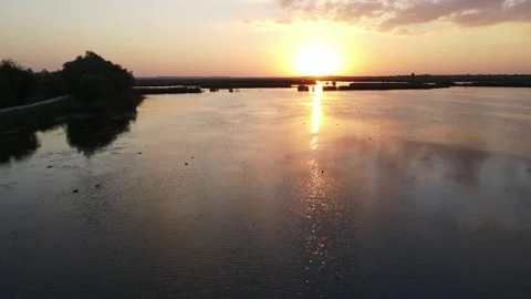 Sunset over lake - 4K Cinematic Drone footage in 60fps Stock Footage 140333458