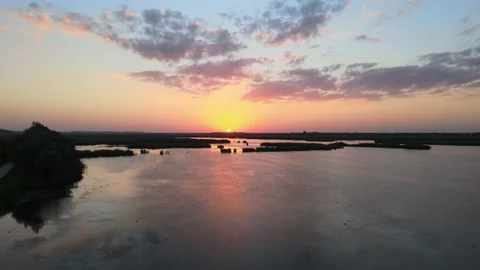 Sunset over lake - 4K Cinematic Drone footage Stock Footage 140333463