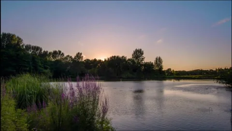 Sunset over lake 4k Stock Footage 143092943