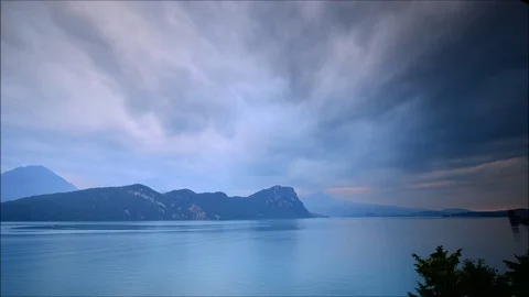 Sunset over the lake and the Alps mountains. Switzerland. Stock Footage 112293172