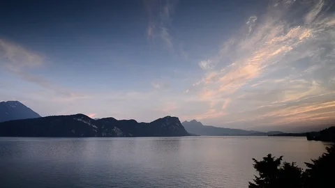 Sunset over the lake and the Alps mountains. Switzerland. Stock Footage 112295855